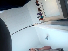 Attractive amateur ladies taking a shower on hidden cam
