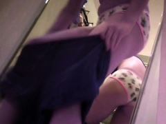 Gorgeous Oriental babe trying on new outfits on hidden cam