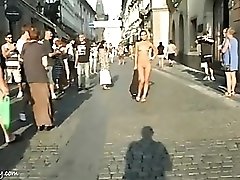 Naked young lady on a busy public street